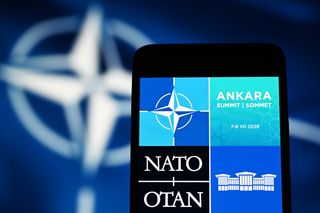 In this photo illustration, a 2026 Ankara NATO summit logo is seen on a smartphone screen. The 2026 Ankara Summit is a future meeting of NATO member states, scheduled to be held in Ankara, Turkey, on 7–8 July 2026. (Photo Illustration by Pavlo Gonchar/SOPA Images/LightRocket via Getty Images)