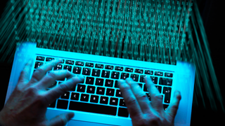 shady-computer-hacker-hands-header-GettyImages-1175889118.png