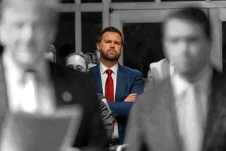 JD Vance standing and watching figures in the foreground.