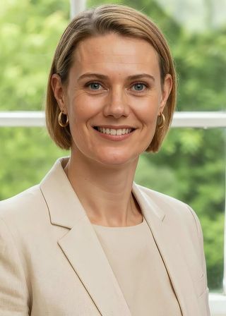 Dr Merriden Varrall