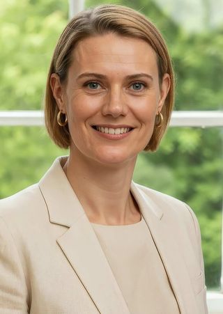 Dr Merriden Varrall