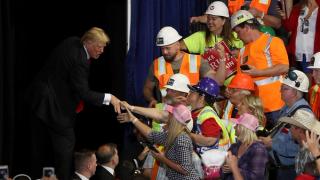 Donald Trump greeting workers