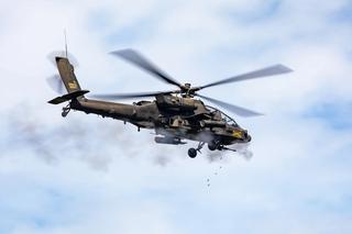 U.S. Army AH-64E Apache Guardian helicopter pilots assigned to the 16th Combat Aviation Brigade 4-6 Air Cavalry Squadron, Joint Base Lewis-McChord, Washington, fire the 30 mm M230 cannon at the joint strike live fire exercise during Super Garuda Shield 25 in Baturaja, Indonesia, Sept. 3, 2025.