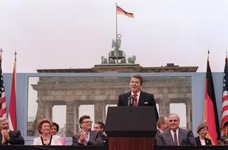 President Ronald Reagan giving a speech in front of the Brandenburg Gate in Berlin, 1987