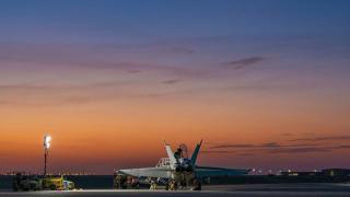 Air Force maintainers deployed on Operation Okra with the Strike Task Element conduct checks on an F/A-18F Super Hornet at a base in the Middle East Region, November 2022