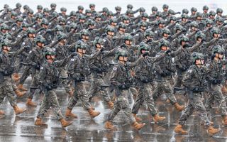 South Korean troops march during a ceremony marking the 75th founding anniversary of the country’s armed forces day at Seoul Air Base