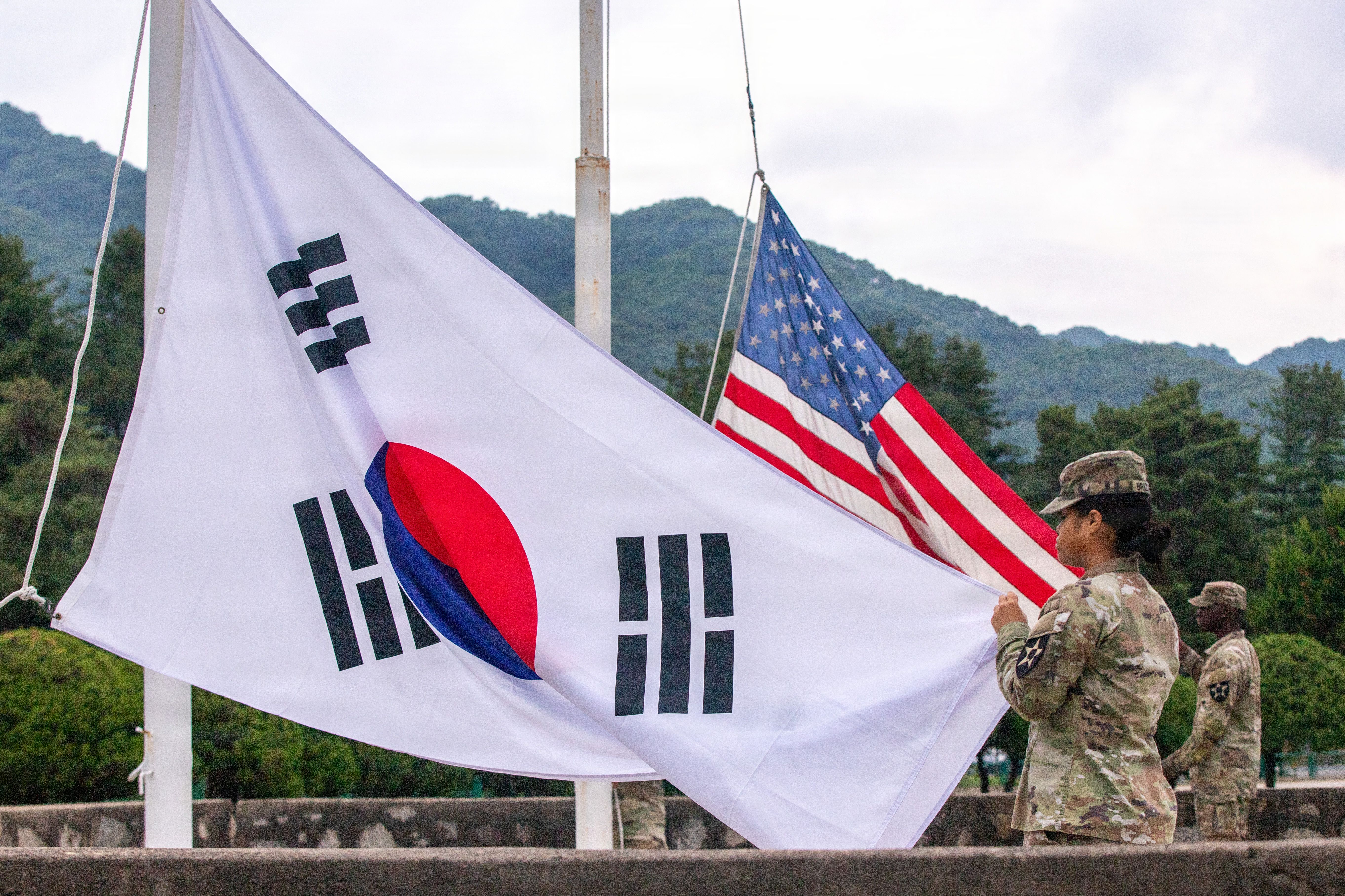The national flags of the United States and the Republic of Korea are raised together during the opening ceremony of KATUSA Friendship Week at Camp Casey, South Korea, Jun. 8, 2026.