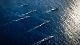 A US P8 Poseidon crew participate in an Anti Submarine Warfare mission off Darwin during Exercise Kakadu 2016