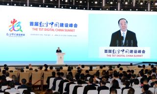 Huang Kunming, head of the Publicity Department of the Communist Party of China Central Committee, speaks at the 1st Digital China Summit, April 2018