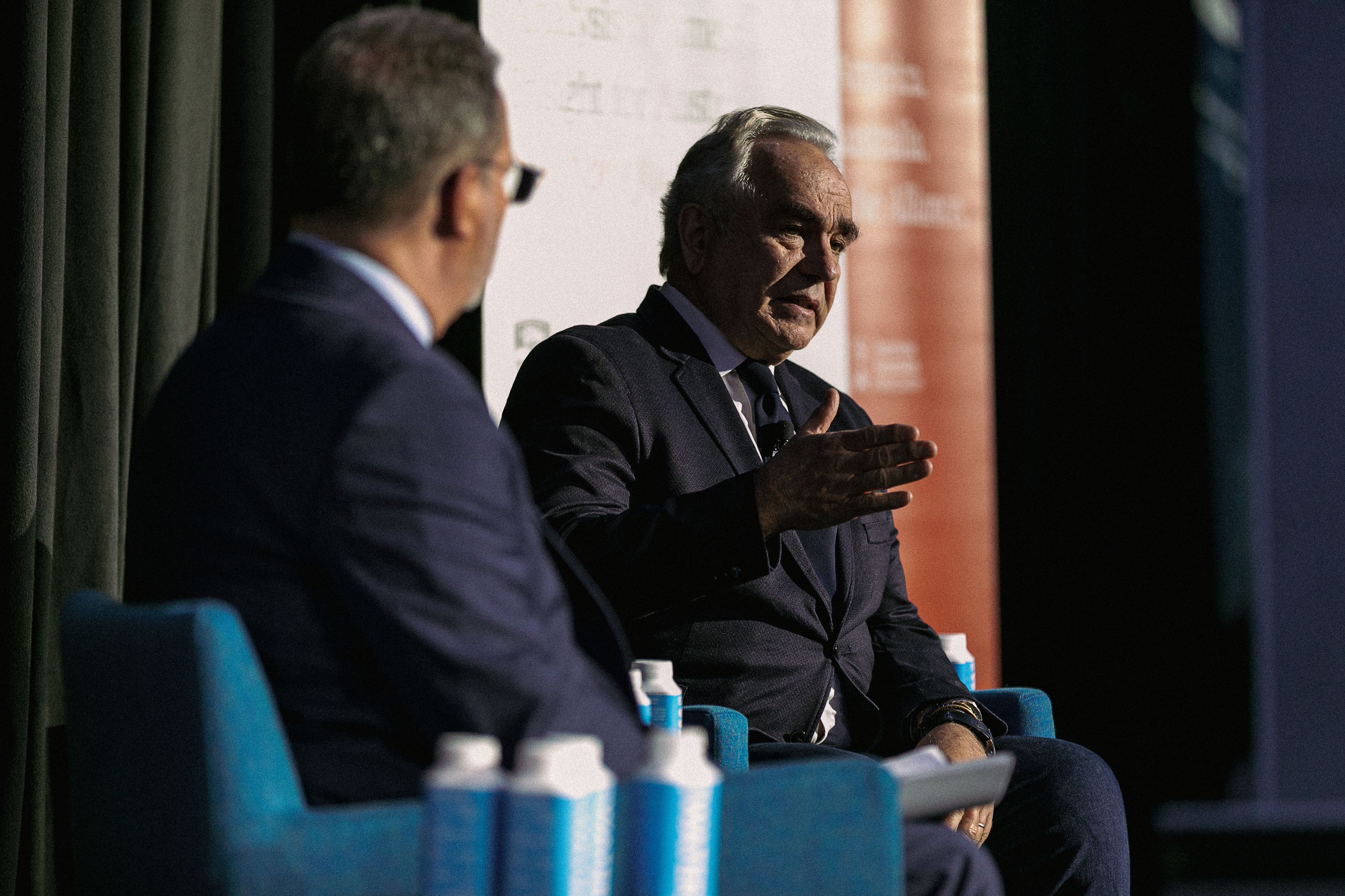 Dr Kurt Campbell chats on stage with Dr Michael Green at the conference