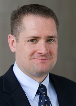 Dr Tom Karako
