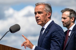 Canadian Prime Minister Mark Carney speaks about the trade dispute with the United States at the Davie Shipyard in Levis, Quebec, Canada on August 24, 2026.