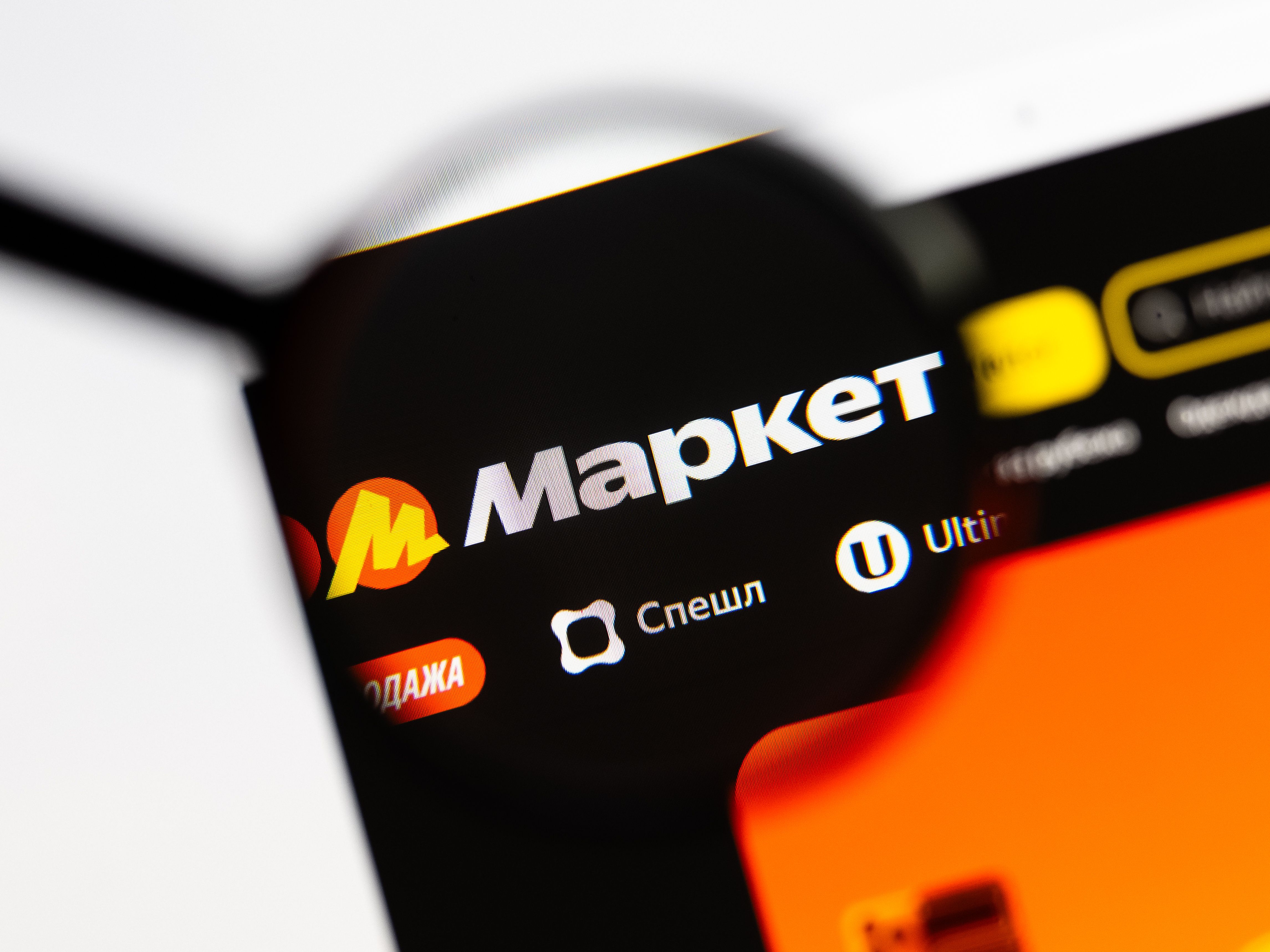 Closeup of Yandex Market website page on a laptop screen.