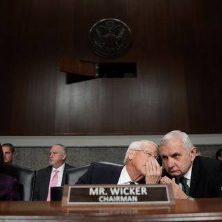 Senate Armed Services Committee Chairman Sen. Roger Wicker (R-MS) (C) talks with Ranking Member Jack Reed (D-RI) during the confirmation hearing for U.S. President-elect Donald Trump's nominee for Secretary of Defense Pete Hegseth