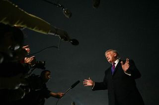 US President Donald Trump speaks to journalists upon returning to Joint Base Andrews, Maryland on 11 March 2026.