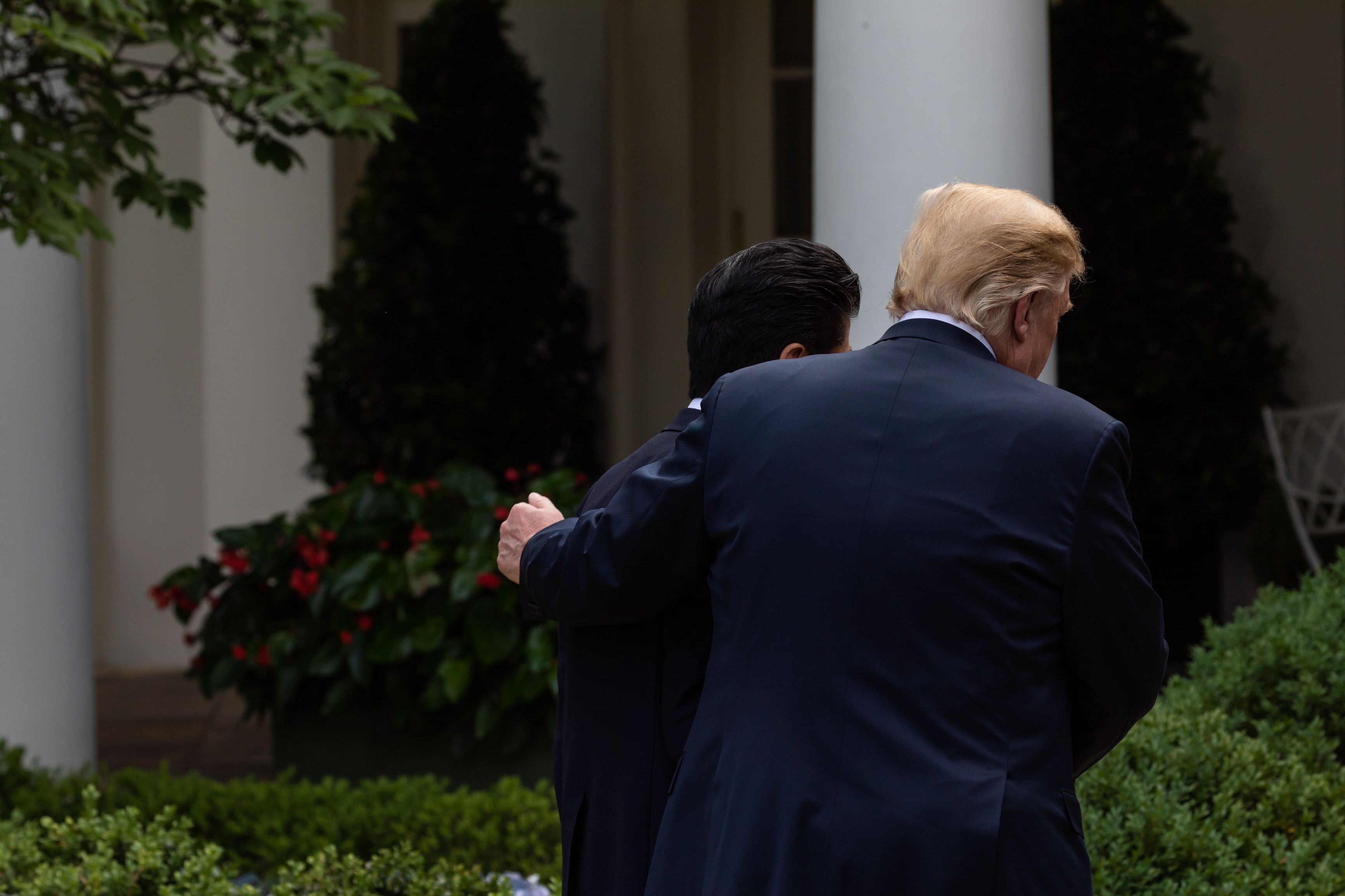 Prime Minister of Japan Shinzo Abe, and US President Donald Trump leave their joint press conference in the Rose Garden at the White House in Washington, DC, on Thursday, June 7, 2018. 