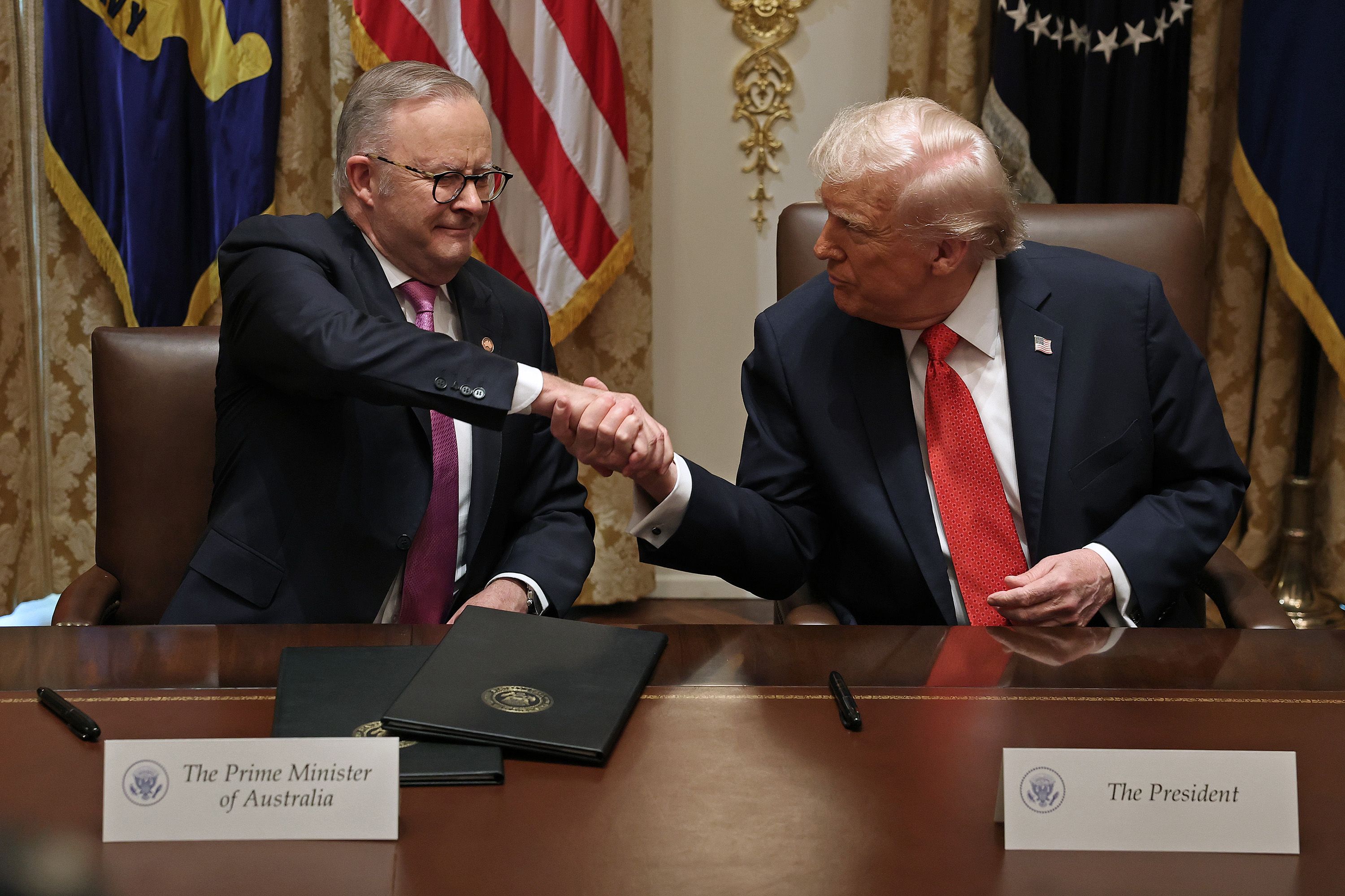 Australia's Prime Minister Anthony Albanese and US President Donald Trump after signing an $8.5 billion rare earth minerals agreement during a bilateral meeting at the White House, October 2025. 