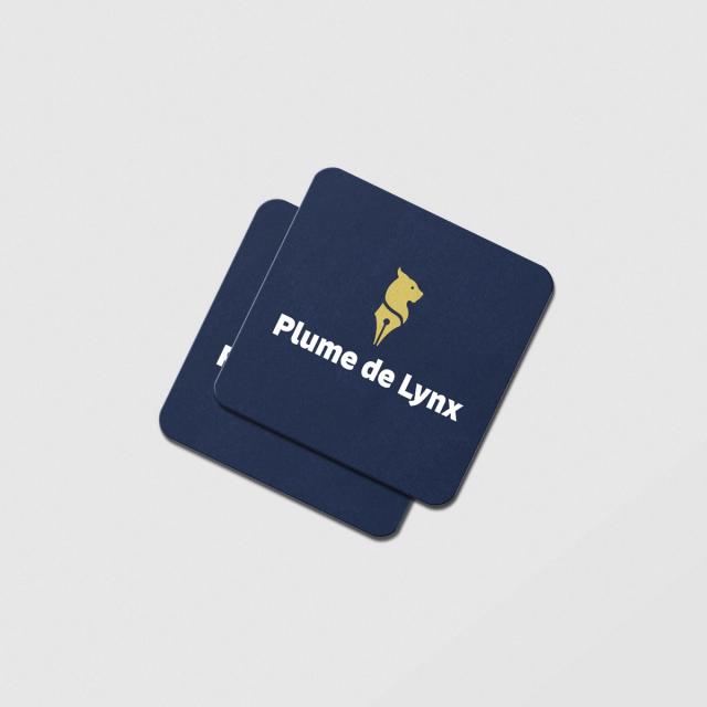 Cartes de visite Plume de Lynx bleu nuit au logo doré