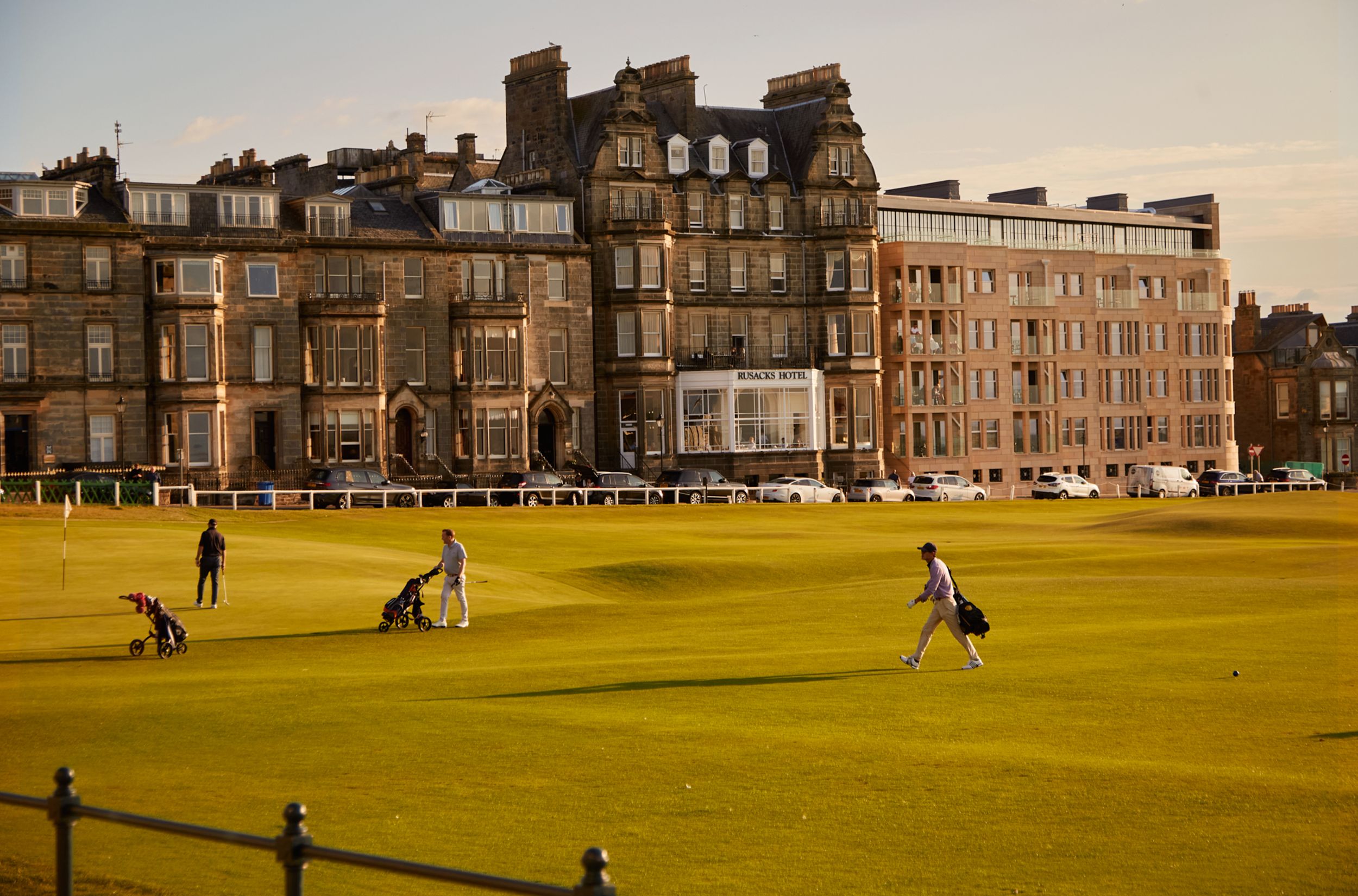 golfers in front of Marine & Lawn Rusacks