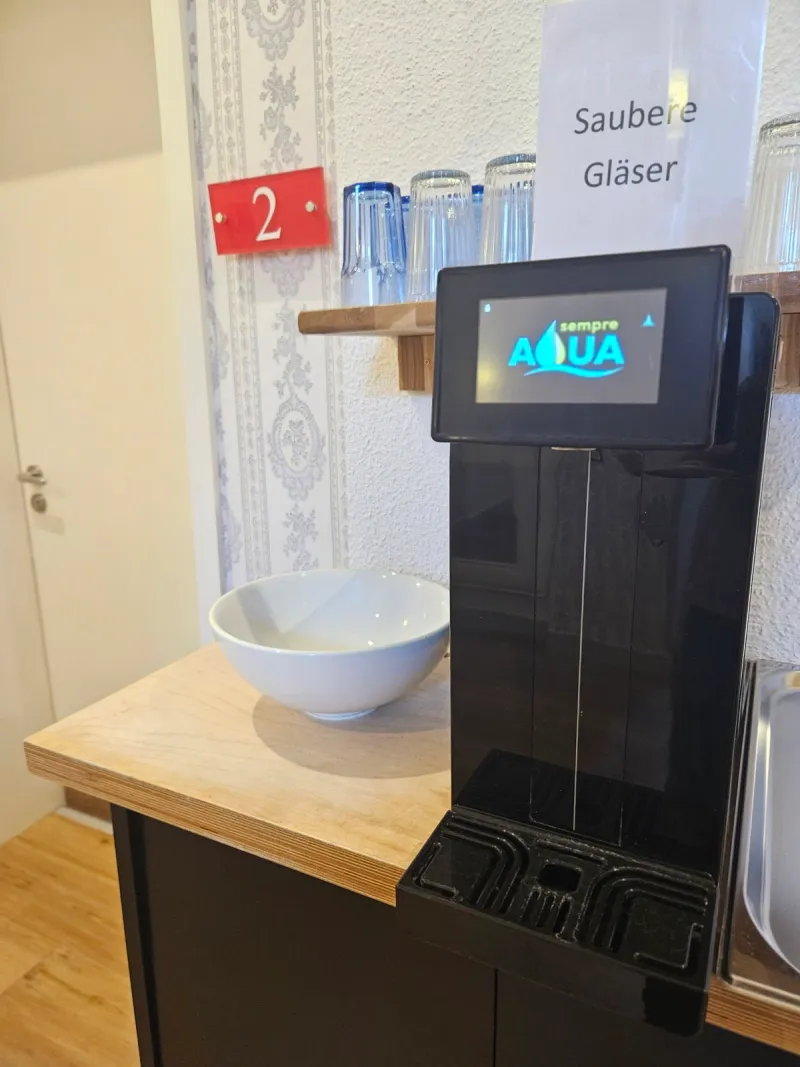 Historic staircase in Hotel Almrausch Bad Reichenhall – view 3