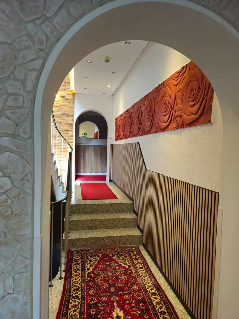 Historic staircase in Hotel Almrausch Bad Reichenhall – view 6