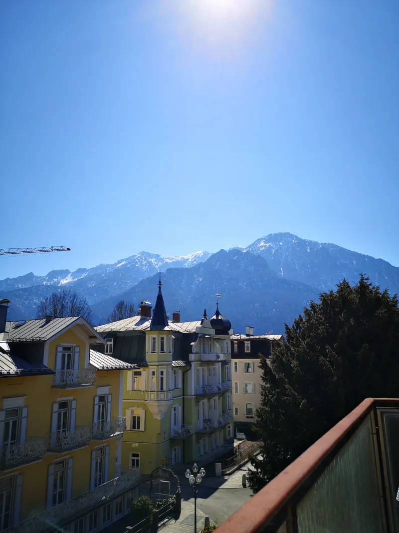 View from Hotel Almrausch balcony over Bad Reichenhall old town and the snow-capped Berchtesgaden Alps