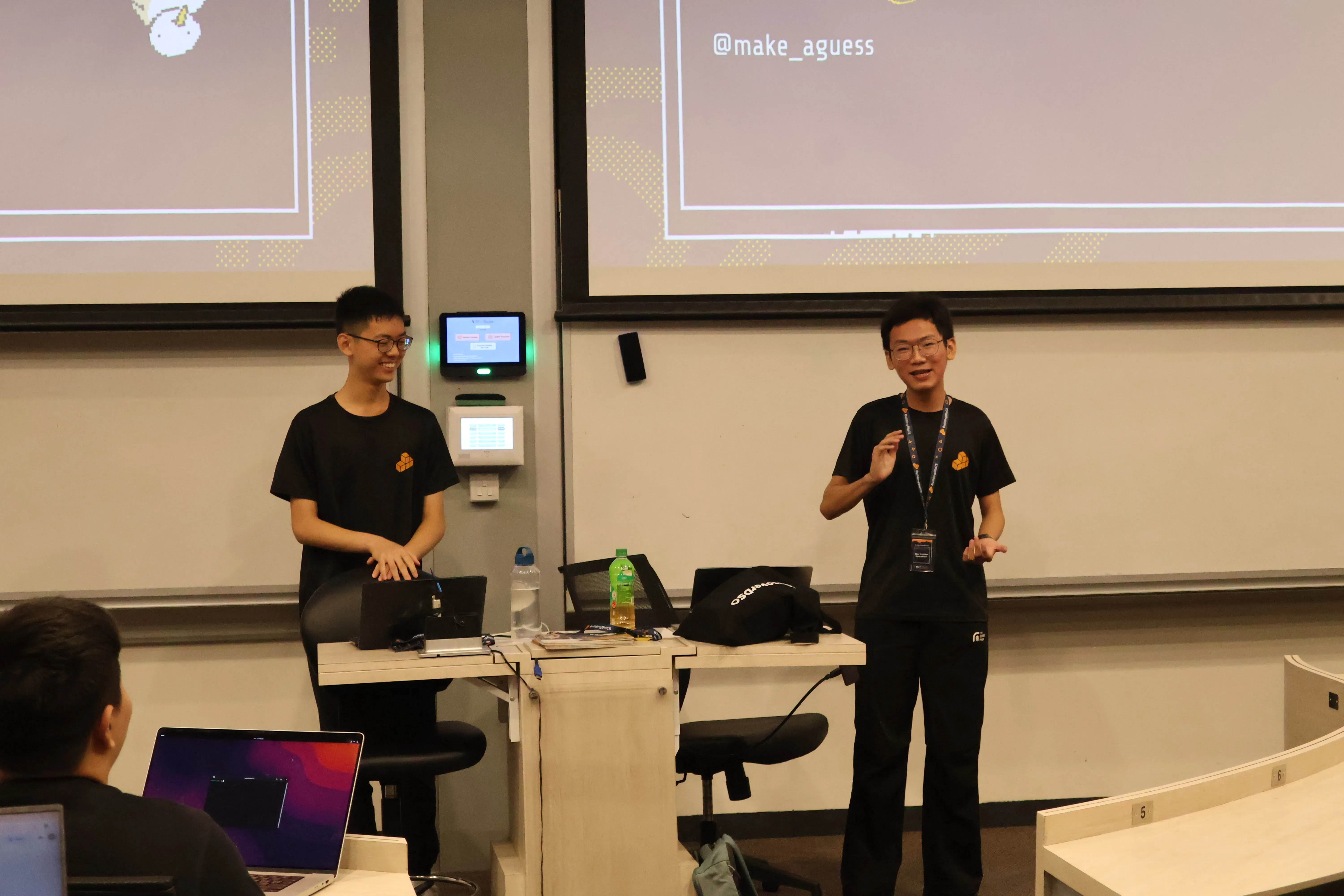 Two organisers speaking at a BuildingBlocs workshop