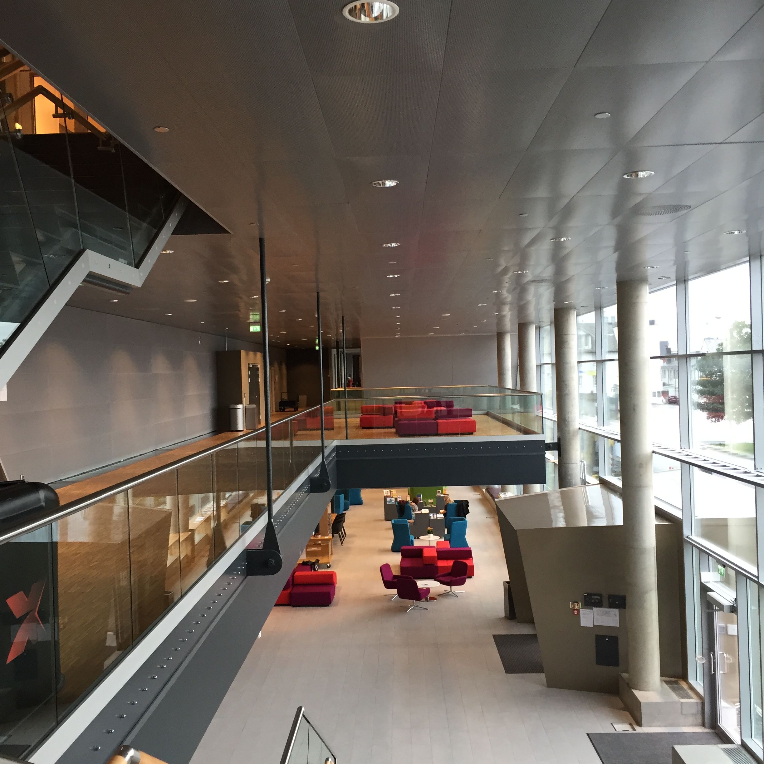 a large building with a lot of windows and stairs