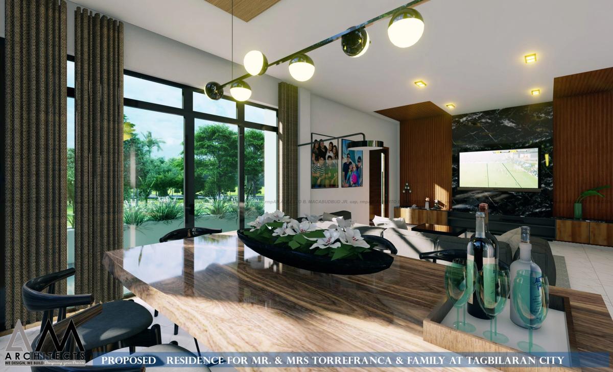 Living area with feature wall and track lighting
