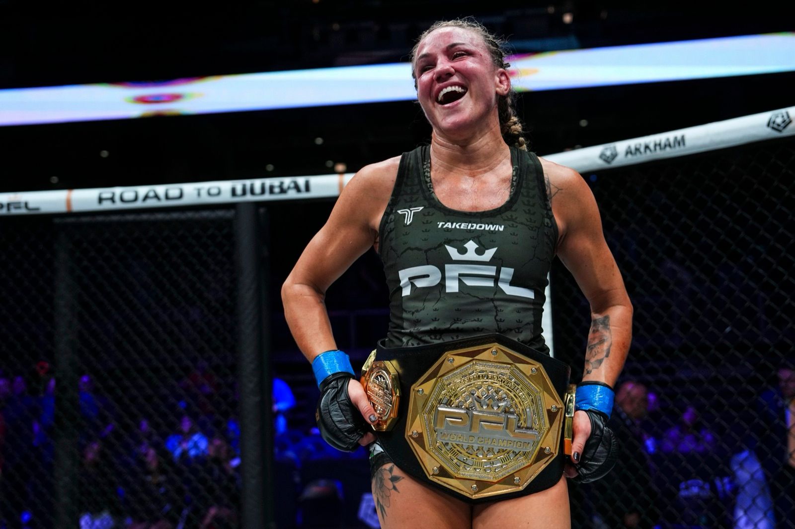 Jena Bishop with the PFL women's flyweight world title belt at PFL Chicago