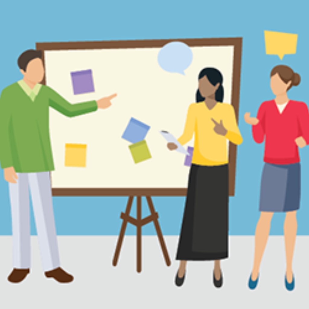 Three employees looking at a whiteboard