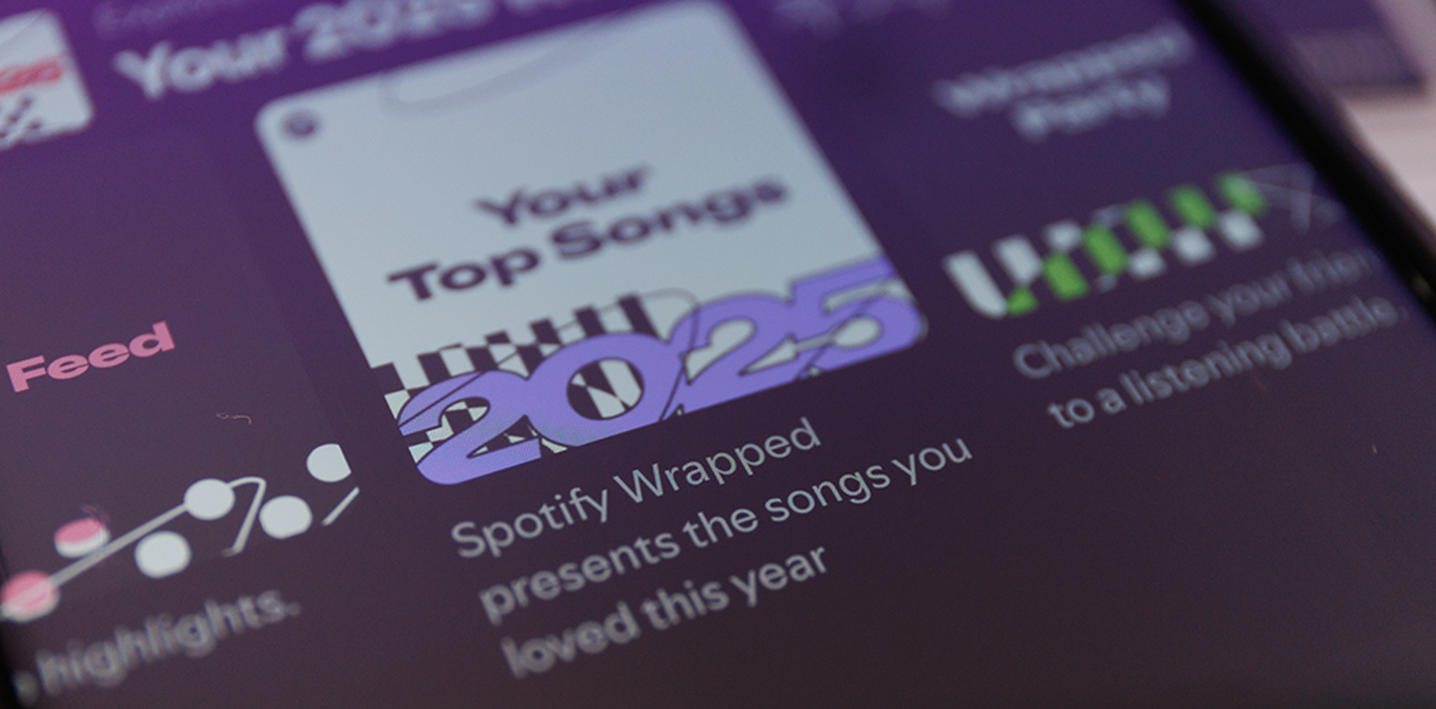 An image of a mobile phone screen displaying an album in Spotify: Spotify Wrapped Presents the songs you loved this year