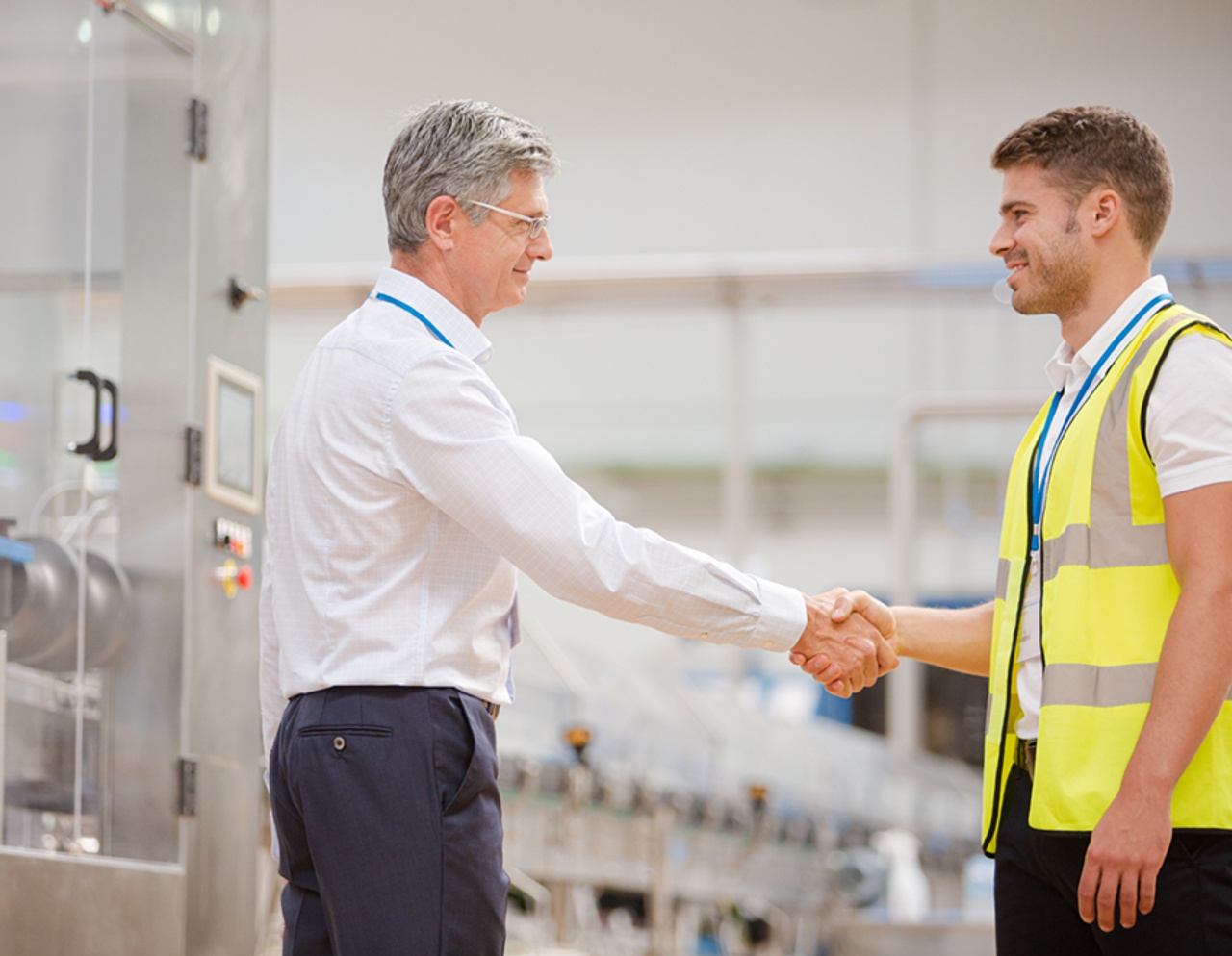Supervisor shaking hands with employee