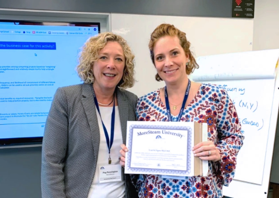 Students presented with their MoreSteam Certifications