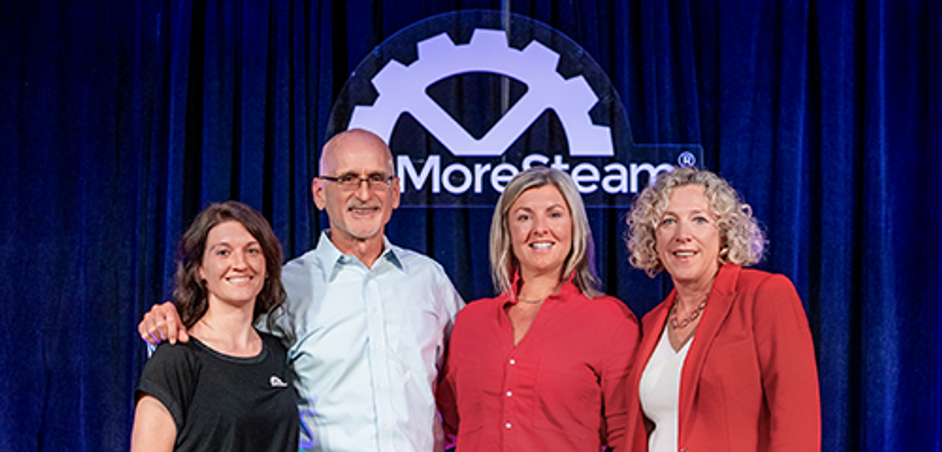 MoreSteam CEO Bill Hathaway posing with President, Peg Pennington, Vice President of Marketing Lindsay Van Dyne, and partnership representative from Mercy Ships Stacey Jennette.