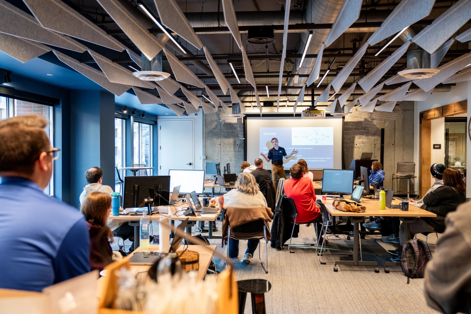 Developer giving a presentation at MoreSteam's Annual Hackathon 2026