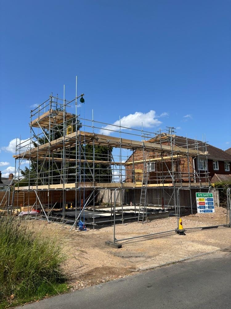 Scaffolding around a new-build house under construction