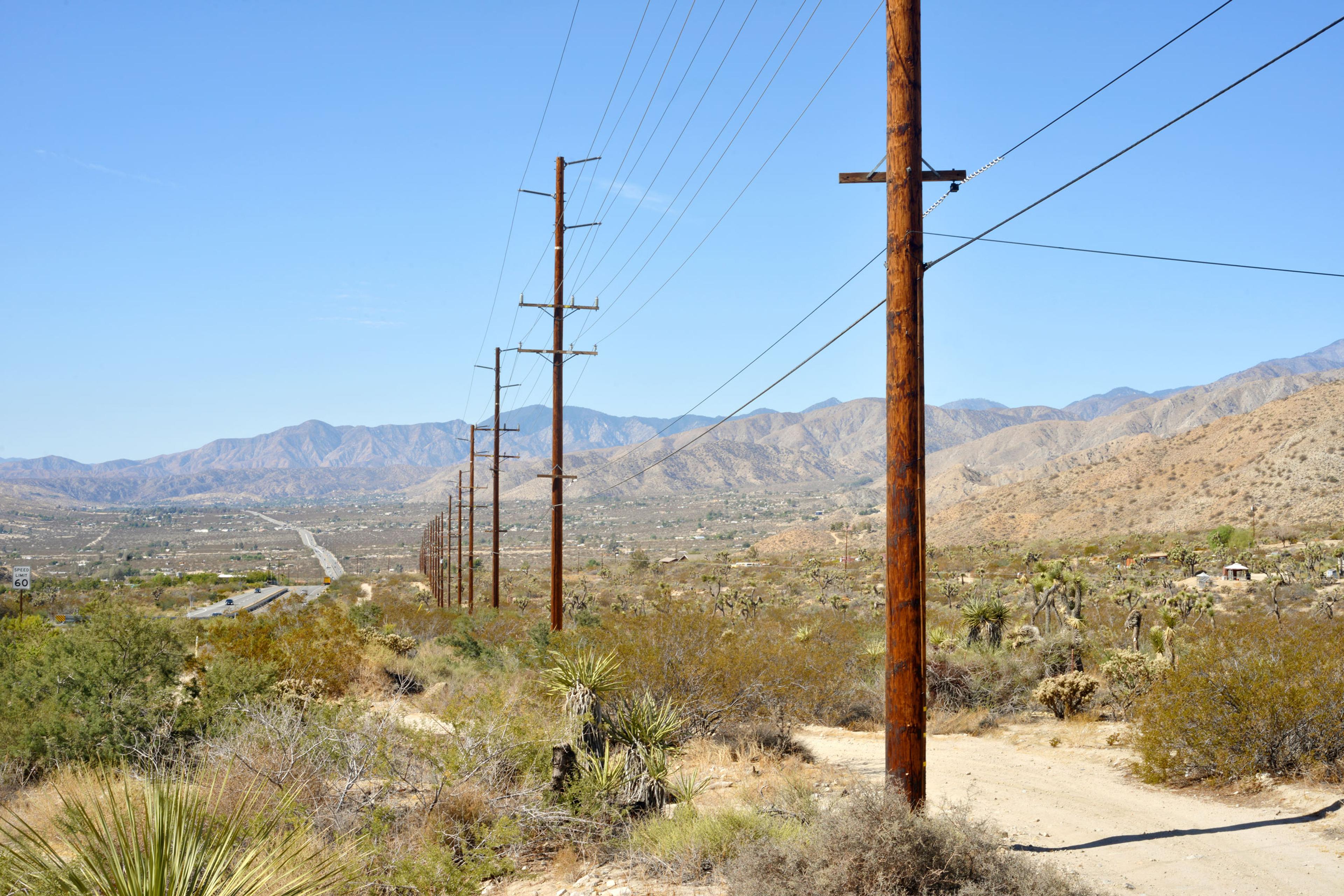 Utility poles in the desert