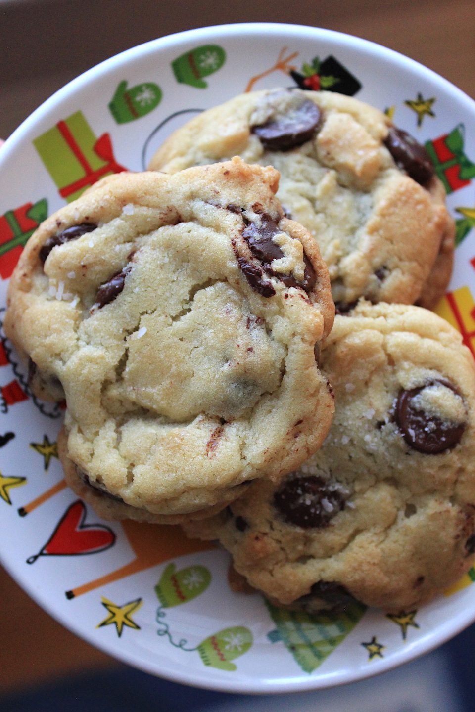 Chocolate chip cookies with large chocolate pieces on a holiday plate