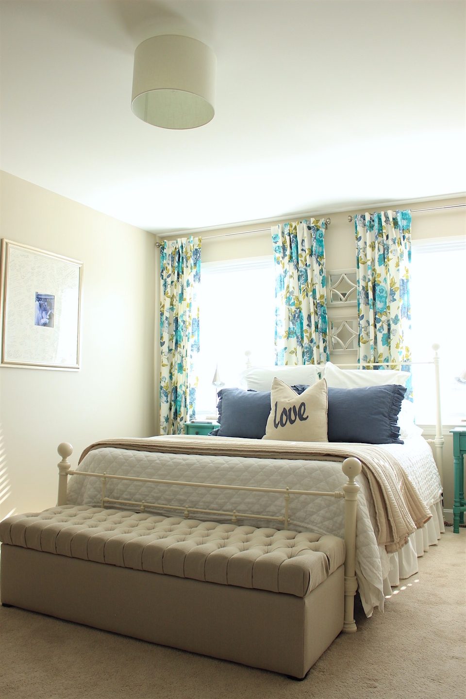 Marisa’s master bedroom with Sherwin-Williams Accessible Beige walls
