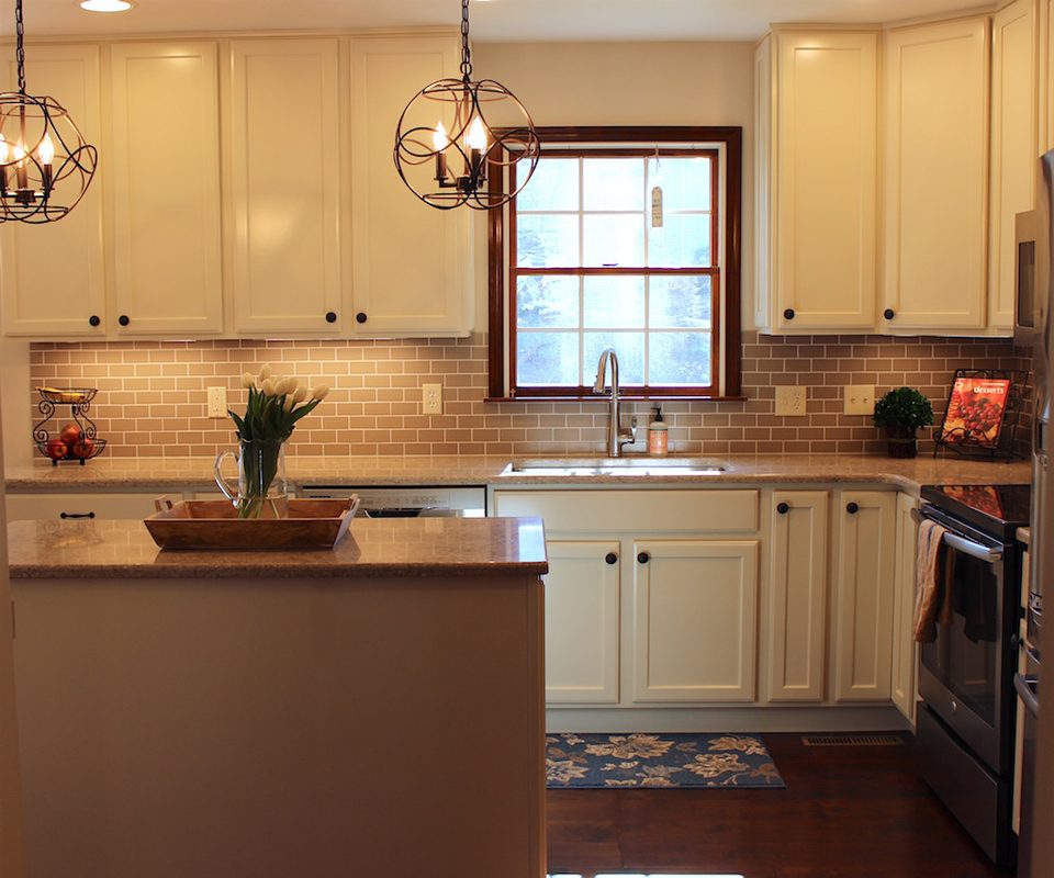 Kitchen with a lighter mix of Sherwin-Williams Accessible Beige above the window
