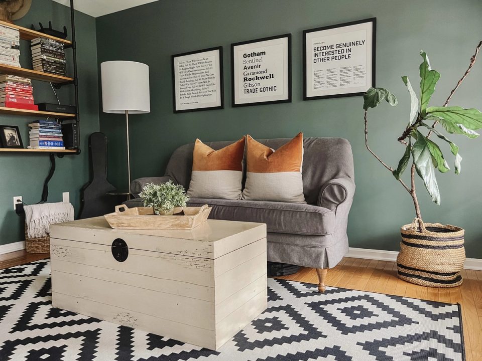Caldwell Green office with a gray armchair, warm pillows and a brass floor lamp