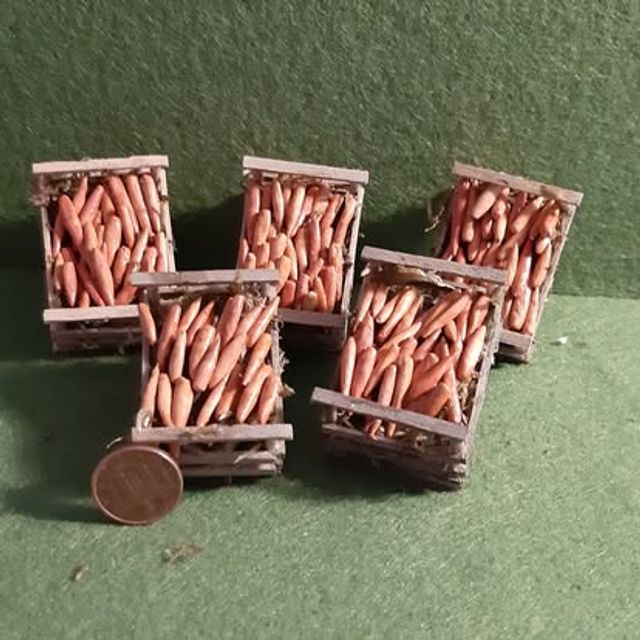 Set di cassette in legno con carote arancioni in miniatura
