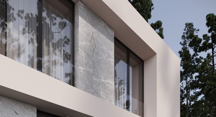 A marble-look wall panel on the exterior of a modern building