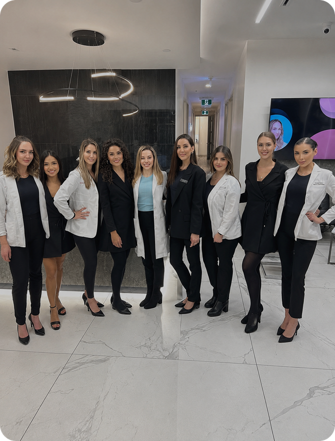 The FCP Dermatology team photographed together in the clinic reception