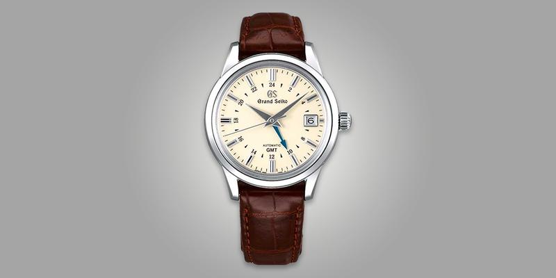 Grand Seiko SBGM221 GMT Dress watch with white dial on brown leather strap