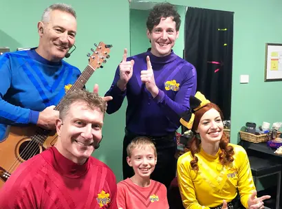 Make-A-Wish Australia wish kid Ben backstage with The Wiggles