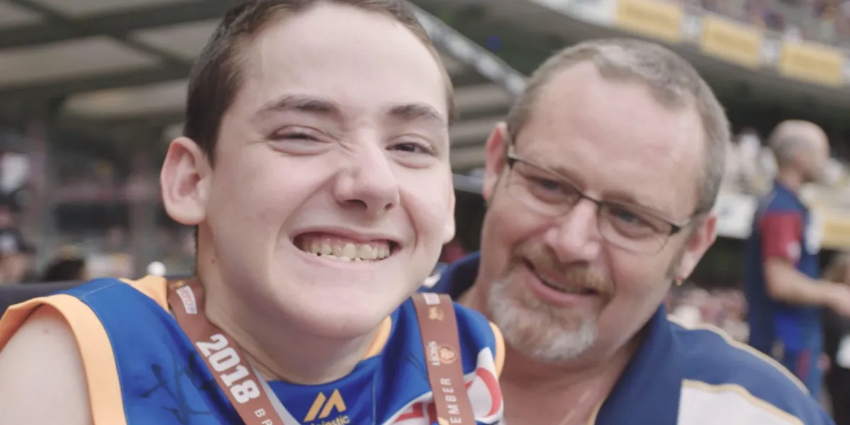 Make A Wish Australia - Ace on his wish smiling with his dad