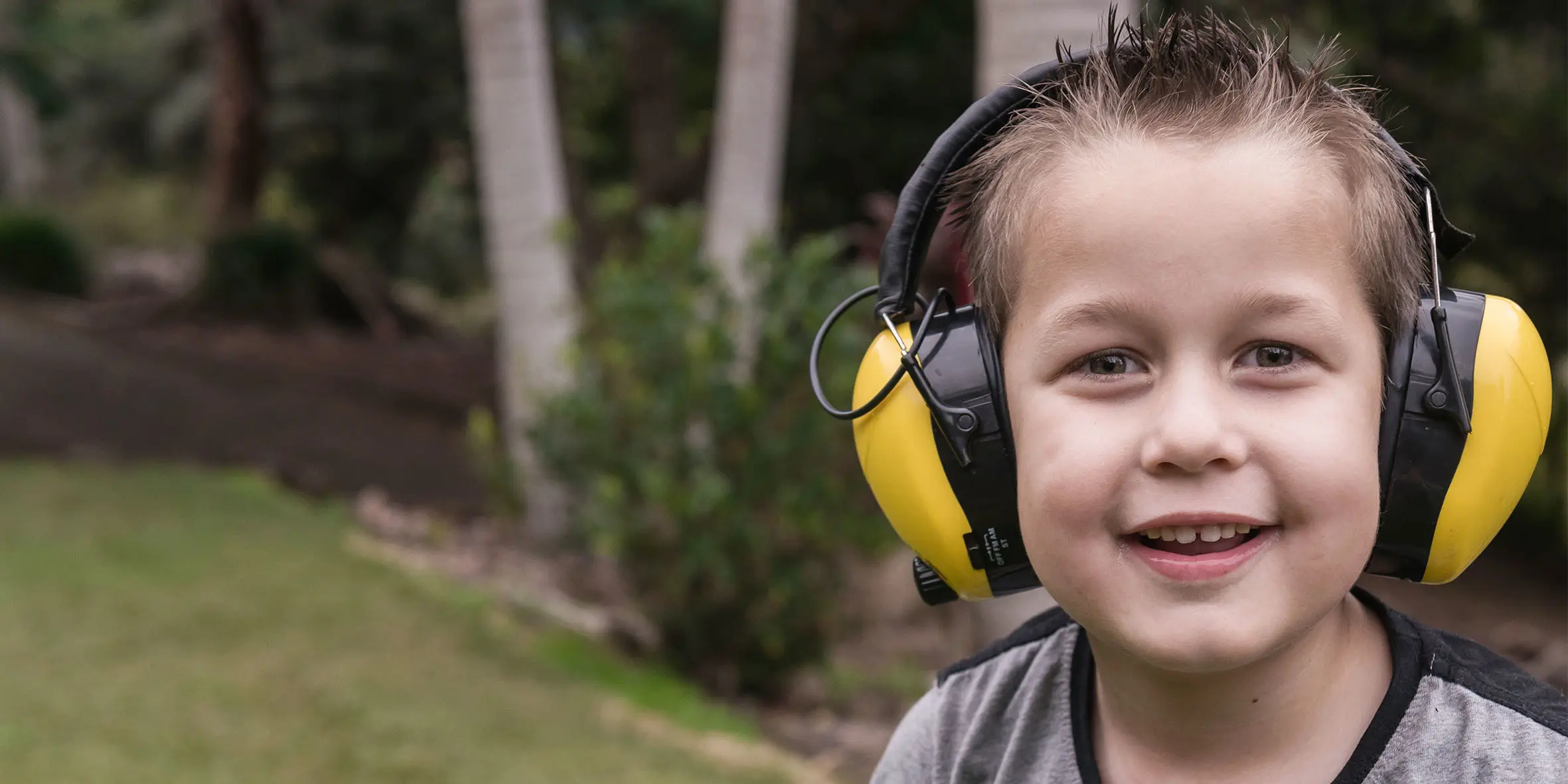 Make A Wish Australia Children's Charity - Bailey on his wish to get a mow mow like his pop wearing ear muffs