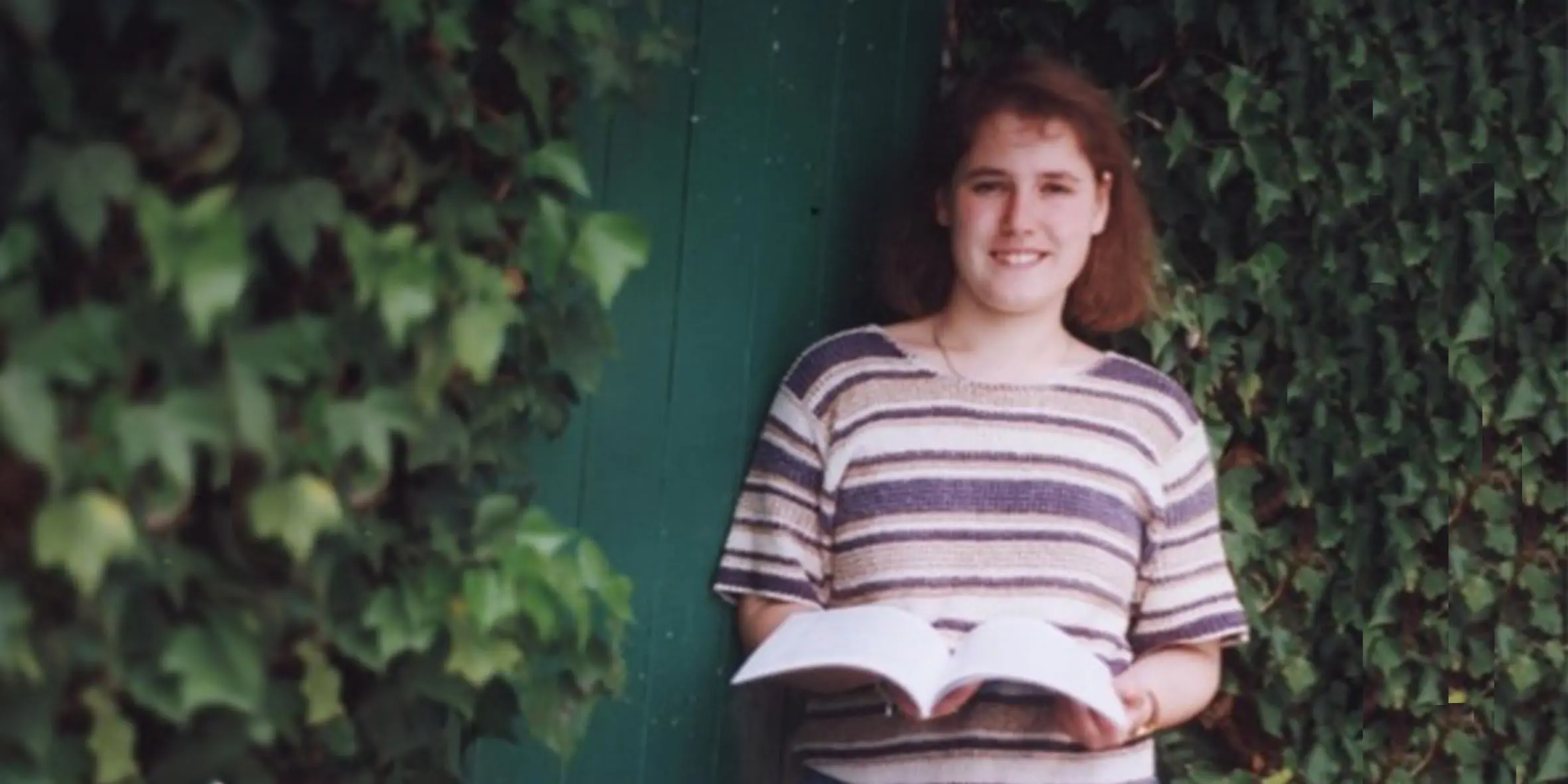 Kylie with her book that was published for her wish